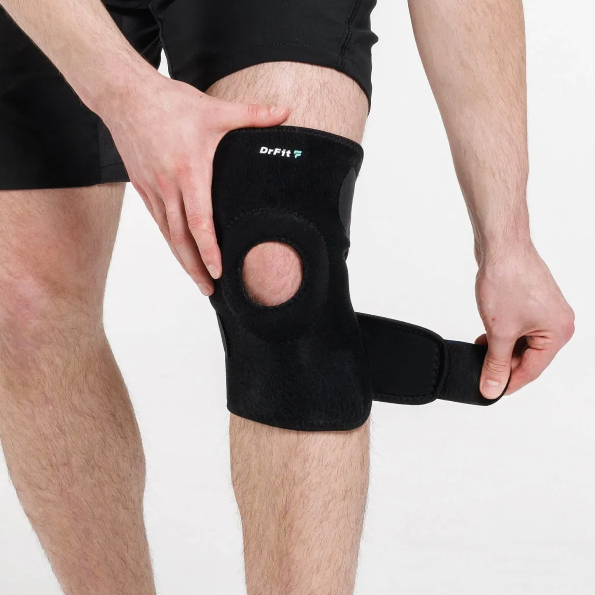DrFit Zapinany stabilizator kolana z neoprenu z otworem na rzepkę