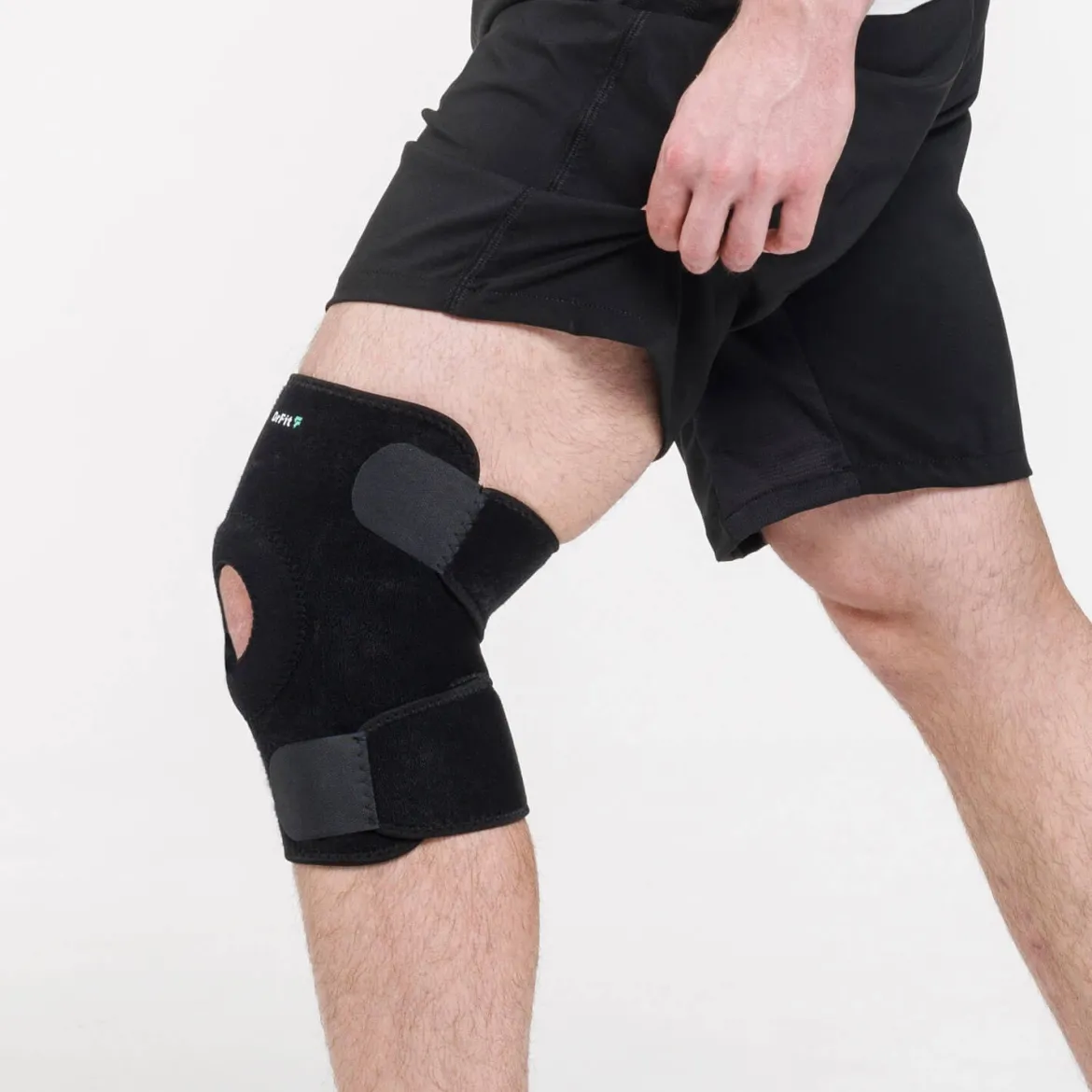 DrFit Zapinany stabilizator kolana z neoprenu z otworem na rzepkę